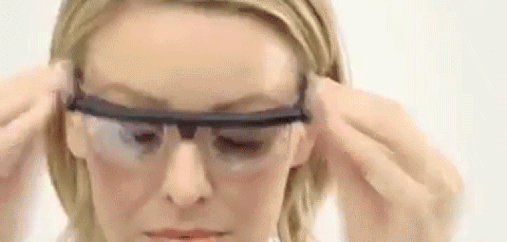 woman adjusting her Flex Vision Glasses